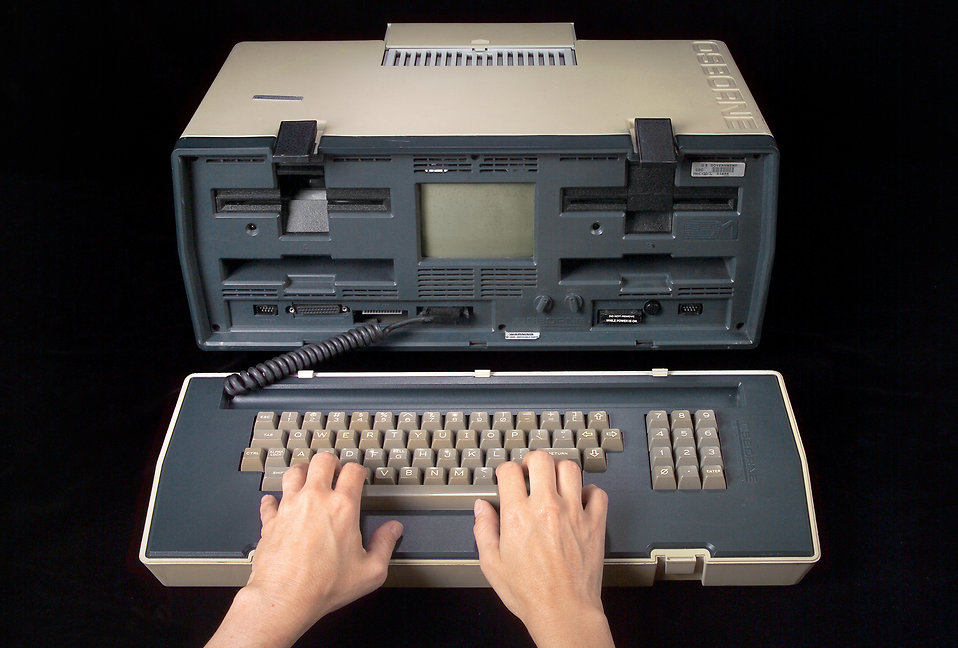 16320-an-early-1980-model-of-a-portable-computer-pv